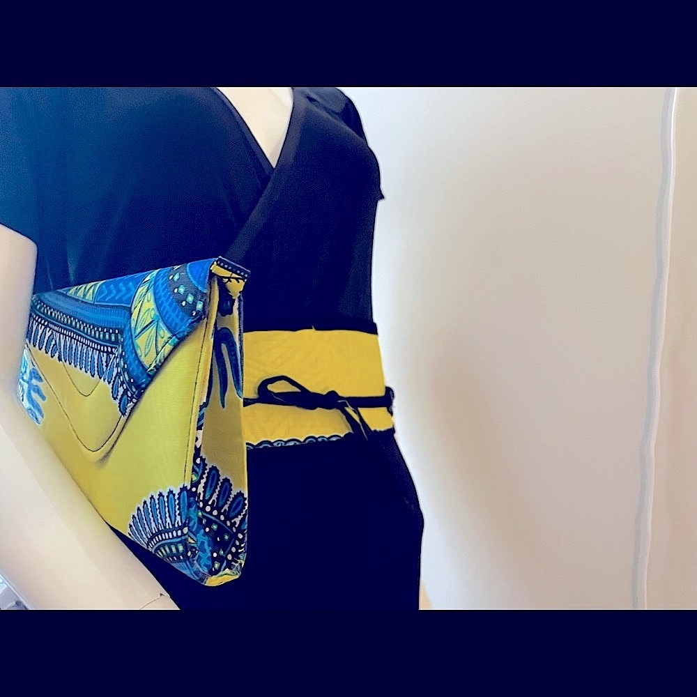 COPY - African fabric clutch with assorted belt.